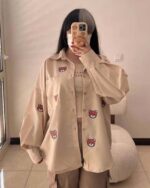 شومیز خرسی ساده در رنگ شیری، یک پوشاک زیبا و کاربردی برای خانم ها